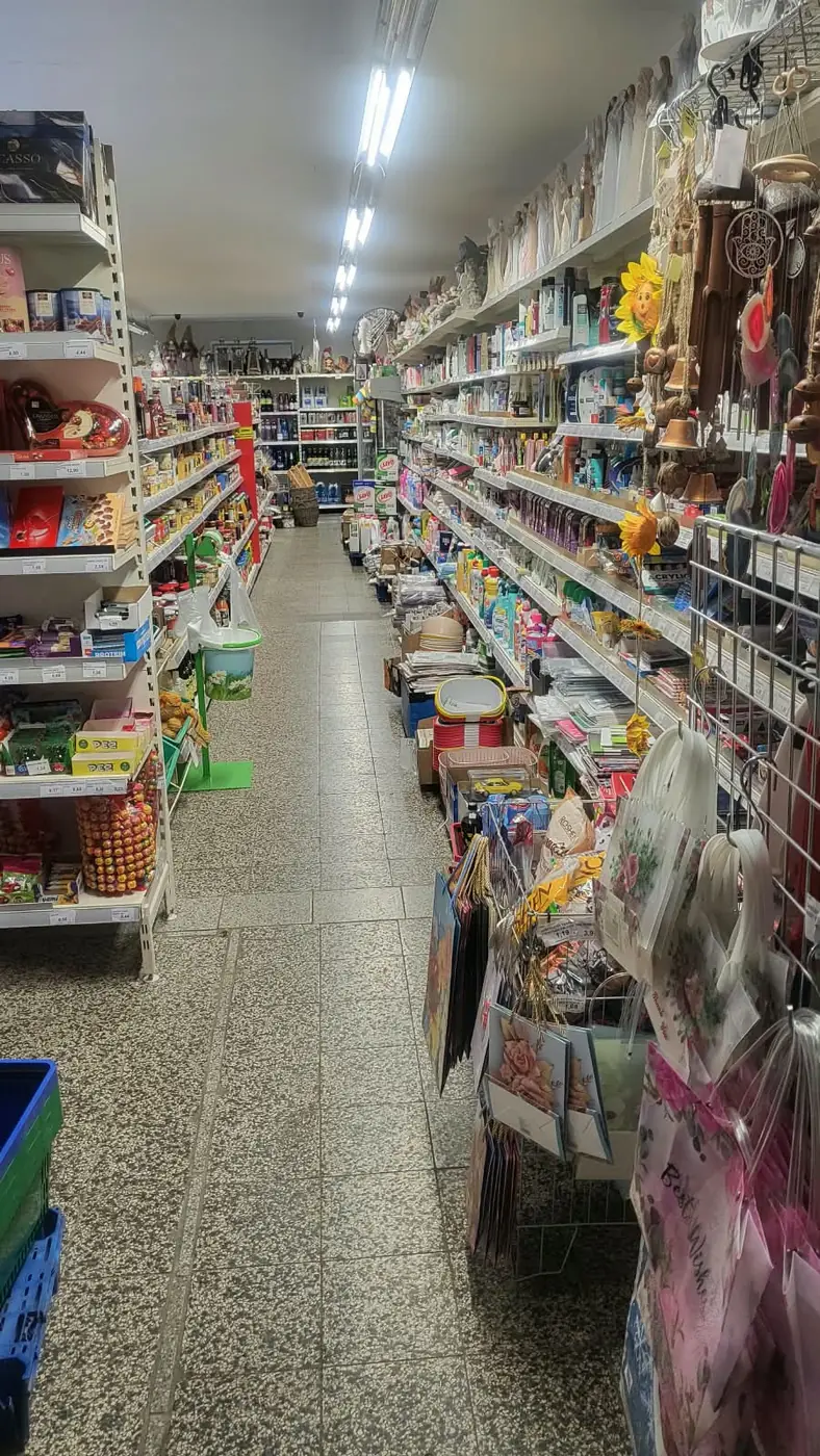 An aisle stocked with food, household goods and gift items